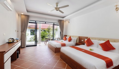 Habitación cuádruple Deluxe, vistas al jardín