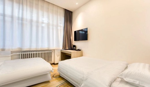 Habitación Confort con 1 cama doble o 2 individuales