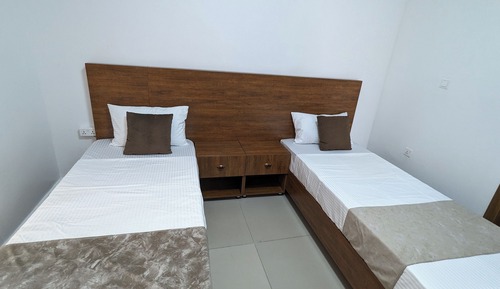 Habitación familiar con 2 camas individuales