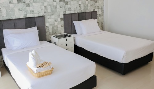 Habitación superior con 2 camas individuales