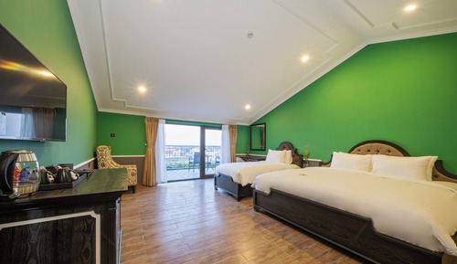 Habitación triple Deluxe, balcón, vistas a la playa