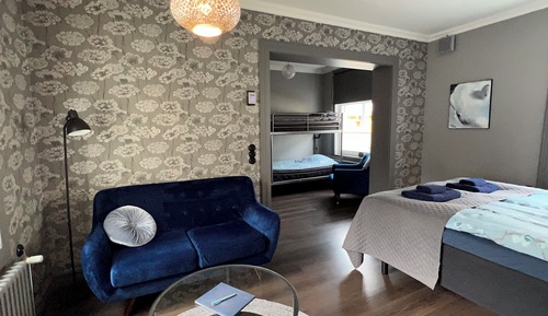 Habitación cuádruple Deluxe, vistas a la ciudad