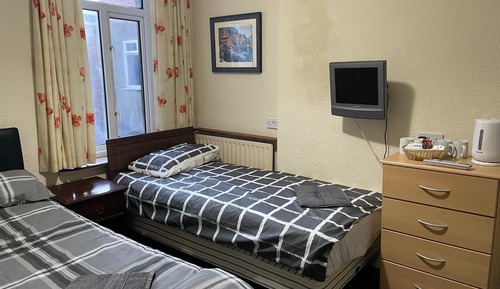 Habitación triple Deluxe