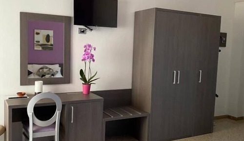 Habitación cuádruple Confort, varias camas, balcón, vistas parciales al mar