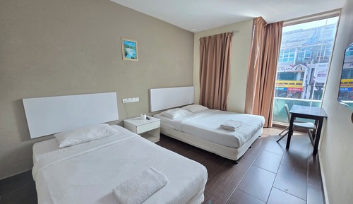 Habitación triple, vistas a la ciudad