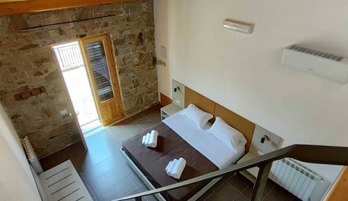 Habitación cuádruple Confort, baño privado, vistas a la montaña