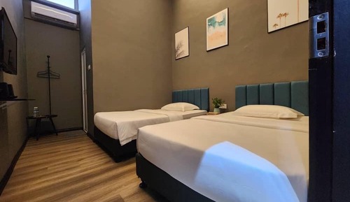 Habitación básica con 2 camas individuales