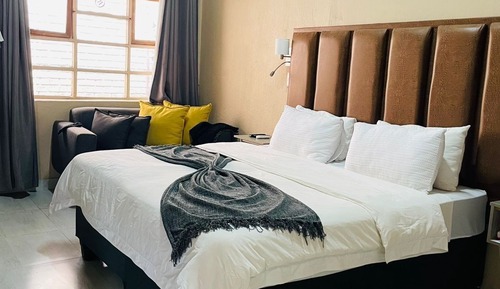 Habitación triple Deluxe, patio, vistas al jardín