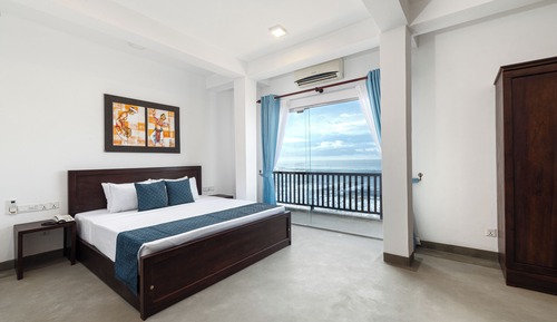 Habitación Deluxe con 1 cama doble o 2 individuales, balcón, vistas al mar