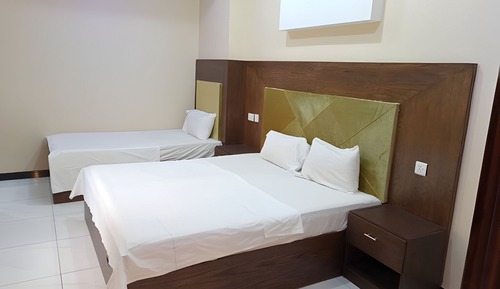 Habitación triple Deluxe