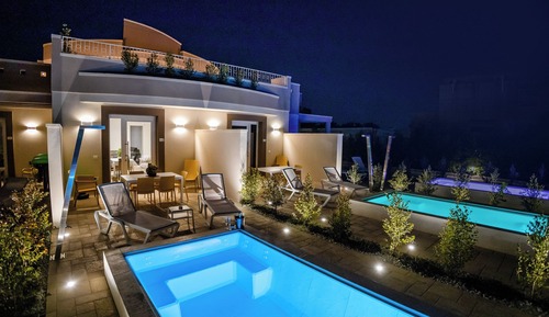 Suite de lujo, patio, vistas a la piscina