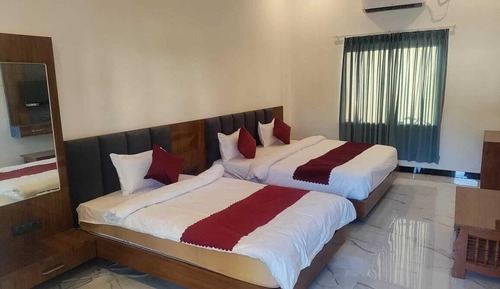Habitación cuádruple Deluxe, vistas al jardín