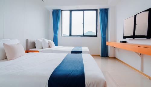 Habitación Deluxe con 1 cama doble o 2 individuales