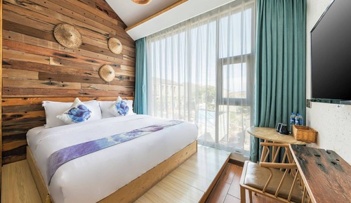 Habitación básica doble, vistas parciales al mar
