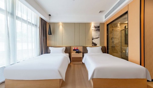 Habitación Confort con 1 cama doble o 2 individuales