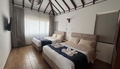 Habitación cuádruple Deluxe