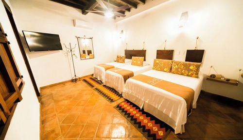 Habitación cuádruple familiar, vistas al jardín