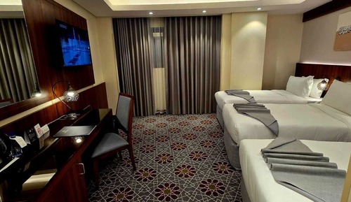 Habitación triple Deluxe