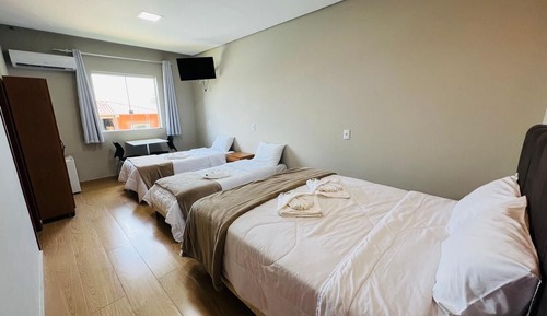 Habitación cuádruple Confort, varias camas, Aire acondicionado