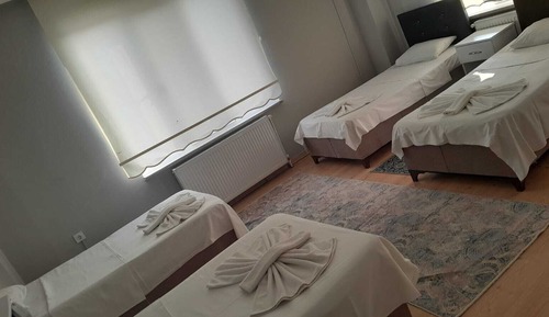 Habitación cuádruple Deluxe, balcón, vistas a la ciudad