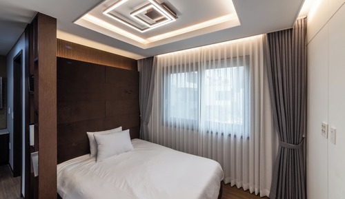 Habitación cuádruple Deluxe, vistas al jardín