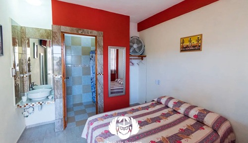 Habitación triple familiar, vistas al jardín