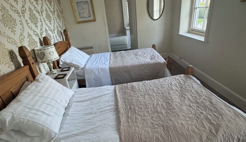 Habitación clásica con 1 cama doble o 2 individuales, vistas al jardín