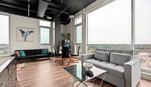 Suite Deluxe, varias camas, cocina, vistas a la ciudad