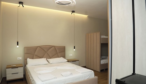 Habitación cuádruple Deluxe