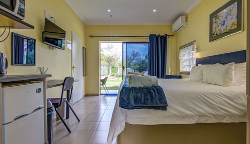 Habitación clásica con 1 cama doble o 2 individuales, balcón