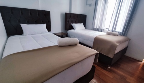 Habitación clásica con 2 camas individuales