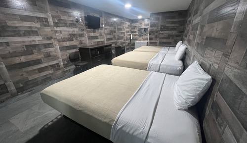 Habitación triple Deluxe