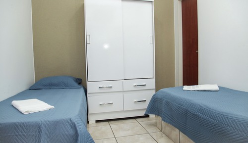 Habitación tradicional con 2 camas individuales