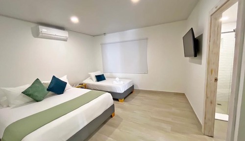 Habitación triple Deluxe