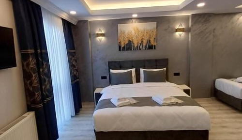 Habitación cuádruple Deluxe, vistas al mar