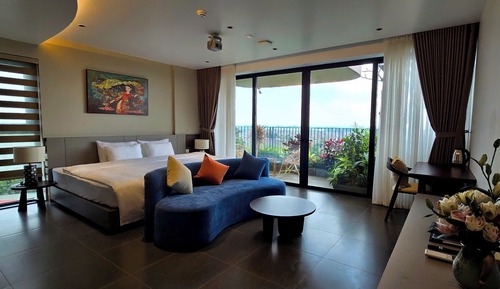 Habitación Signature con 1 cama doble o 2 individuales, balcón, vistas al jardín