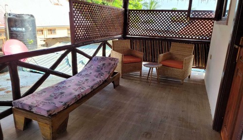 Habitación Deluxe con 1 cama doble o 2 individuales, vistas parciales al mar