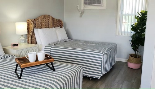 Standard Room Queen and Double Bed Pool View Second Floor