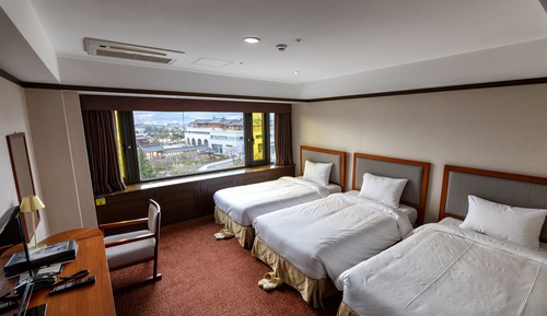 Habitación triple Deluxe (Hwnagnyoung View)