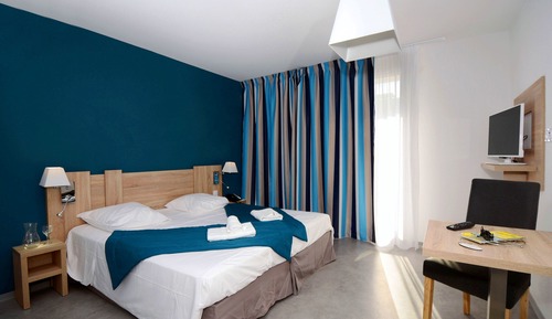Habitación estándar con 1 cama doble o 2 individuales