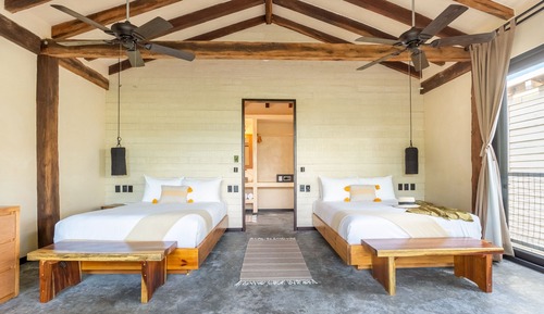 Habitación Deluxe, 2 camas de matrimonio, vistas al jardín