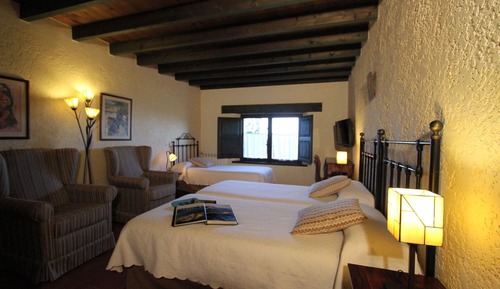 Habitación triple, vistas al mar