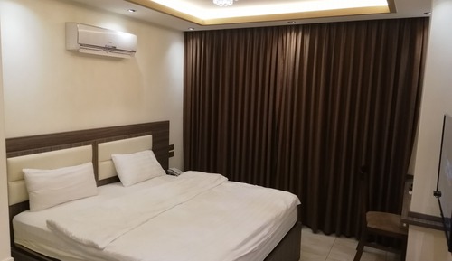 Habitación estándar con 1 cama doble o 2 individuales