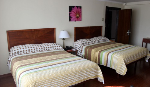 Habitación con 2 camas individuales