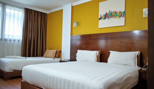 Habitación triple, fumadores