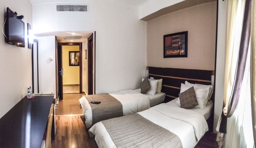 Habitación clásica con 2 camas individuales