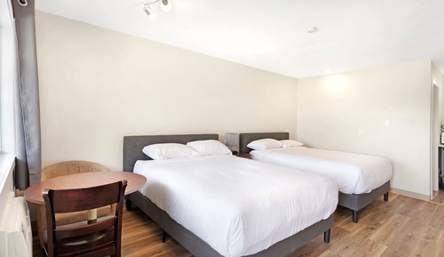 Habitación Deluxe, 2 camas de matrimonio, accesible en silla de ruedas