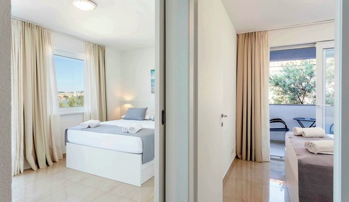 Habitación cuádruple, balcón, vistas al mar