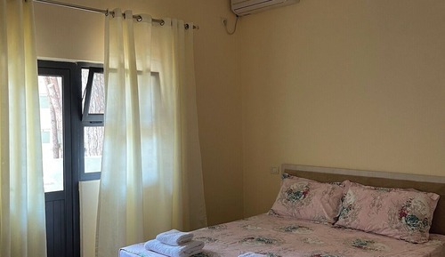 Habitación triple, vistas al jardín