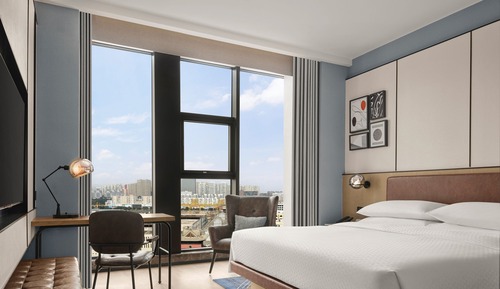 Suite ejecutiva, 1 cama de matrimonio grande, vistas a la ciudad